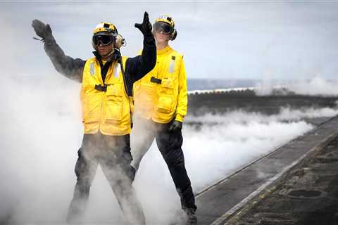 How the US Navy's 'flight deck choreographers' keep aircraft carriers operating
